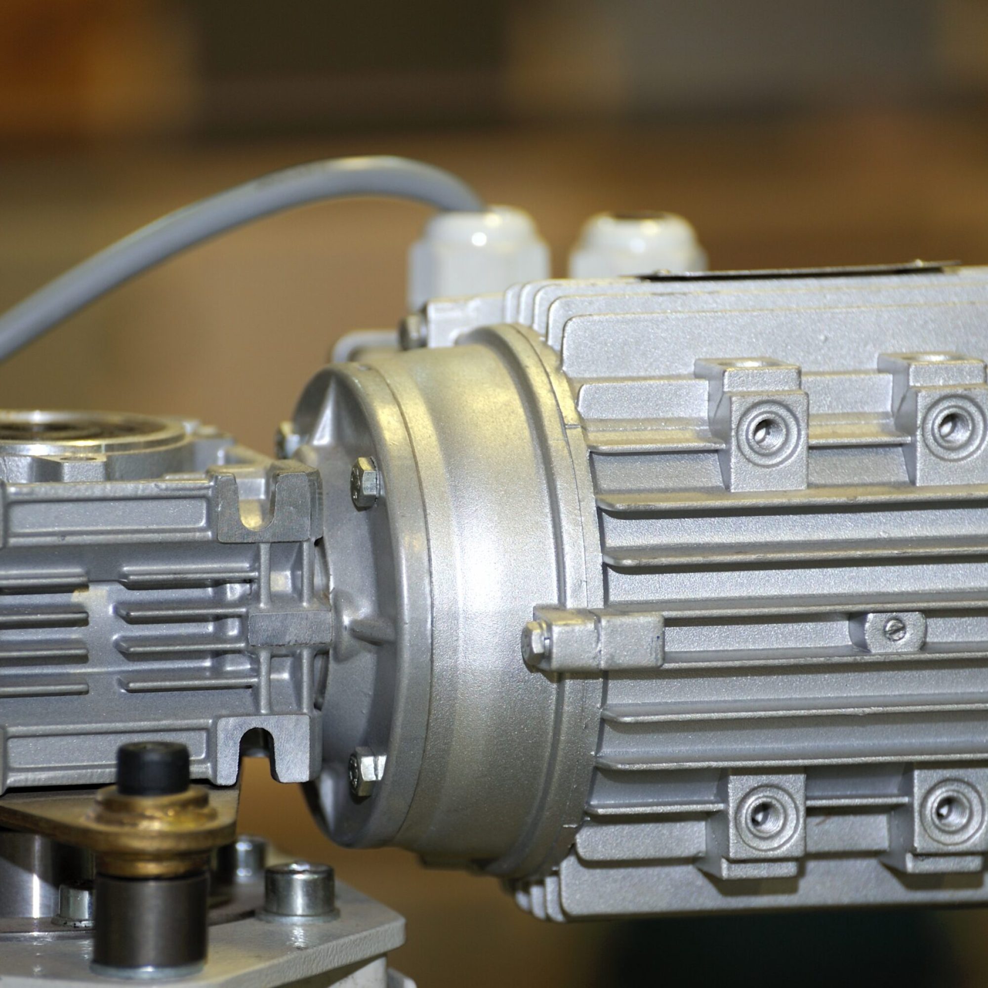 Powerful electric motor with reducer. Electric motor on machine